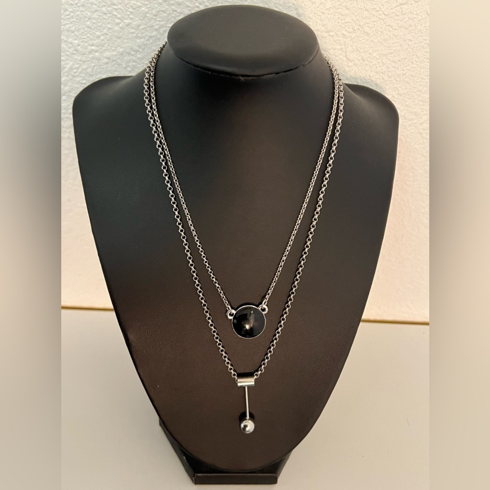 Double-layer chain with Two Charms